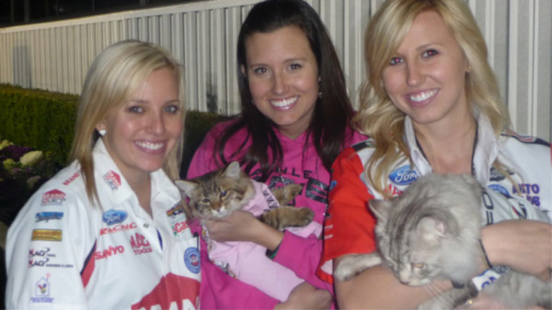 Illustration for article titled Is Drag Racer Ashley Force A Crazy Cat Lady? A Jalopnik Debate